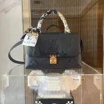 Monogram Embossed Top Handle Flap Bag - Size 24 (Premium Leather) photo review